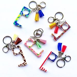 Contactless keychain/door opener